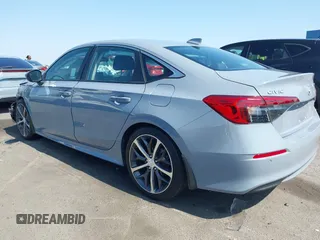 2023 Honda Civic Touring with VIN 2HGFE1F92PH322377, listed as a IAAI auction lot 42361473 with 43,533 mi miles and . Bid and sale history available at DreamBid. Image 3.