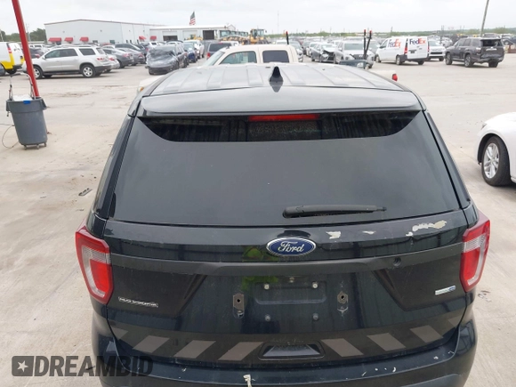 2016 Ford Utility Police Interceptor with VIN 1FM5K8AR9GGB44638, listed as a IAAI auction lot 42020602 with 136,518 mi miles. Bid and sale history available at carsss.com. Image 21.