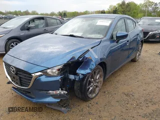 2018 Mazda 3 Touring with VIN 3MZBN1V39JM262260, listed as a IAAI auction lot 42022243 with 89,160 mi miles. Bid and sale history available at carsss.com. Image 2.