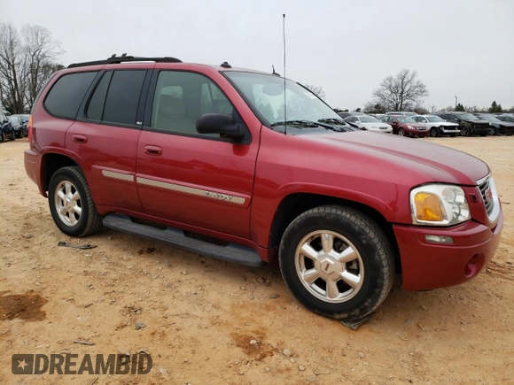 2004 GMC Envoy SLT with VIN 1GKDT13S342262833, listed as a Copart auction lot 87828975 with 203,404 mi miles and Salvage Title. Bid and sale history available at carsss.com. Image 4.