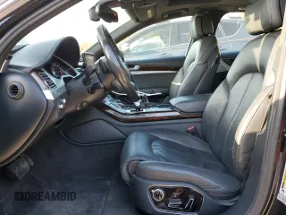 2015 Audi A8 z VIN WAUJGAFD7FN032176, wystawiony jako Copart lot #76943904 z przebiegiem 126 423 mil mil oraz Czysty tytuł • Clean title. Historia ofert i sprzedaży dostępna na DreamBid. Obrazek 7.