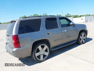2008 Chevrolet Tahoe 3LT with VIN 1GNFC13018R154833, listed as a IAAI auction lot 42232738 with 243,993 mi miles and . Bid and sale history available at DreamBid. Image 4.