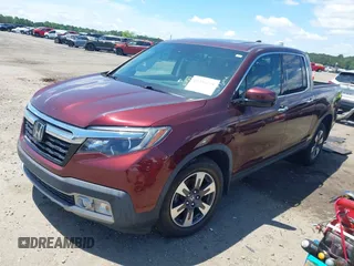 2019 Honda Ridgeline RTL-E with VIN 5FPYK3F72KB031085, listed as a IAAI auction lot 42236249 with 73,612 mi miles and . Bid and sale history available at DreamBid. Image 2.