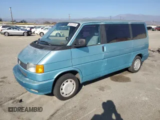 1993 Volkswagen EuroVan с VIN WV2KD070XPH039050, выставлен на аукционе Copart как лот 83112174 с пробегом 182 636 миль миль и Чистый • Clean title. История ставок и продаж доступна на DreamBid. Изображение 1.