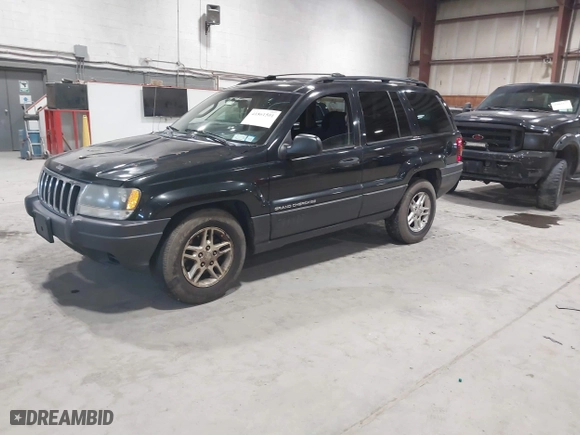 2003 Jeep Grand Cherokee Laredo with VIN 1J4GW48S63C552366, listed as a IAAI auction lot 41861501 with 227,464 mi miles. Bid and sale history available at carsss.com. Image 2.
