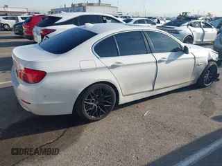 2013 BMW 5 Series 528i with VIN WBAXG5C55DD233592, listed as a IAAI auction lot 41827491 with 113,342 mi miles and . Bid and sale history available at carsss.com. Image 4.