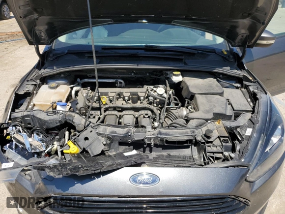 2018 Ford Focus SE z VIN 1FADP3F20JL257320, wystawiony jako Copart lot #55956435 z przebiegiem 26 919 mil mil oraz Szkoda całkowita • Salvage title. Historia ofert i sprzedaży dostępna na DreamBid. Obrazek 11.