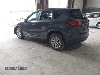 2015 Mazda CX-5 Touring with VIN JM3KE4CY6F0510002, listed as a IAAI auction lot 42045284 with 88,949 mi miles and . Bid and sale history available at DreamBid. Image 3.