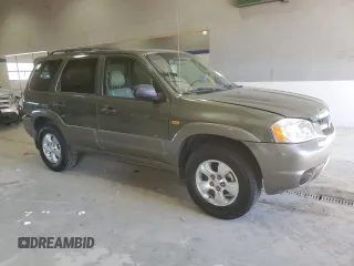 2002 Mazda Tribute LX with VIN 4F2YU09142KM39082, listed as a Copart auction lot 49973375 with 128,002 mi miles and Clean Title. Bid and sale history available at carsss.com. Image 4.