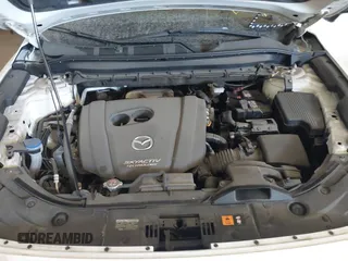 2019 Mazda CX-5 Grand Touring with VIN JM3KFBDM5K0520852, listed as a IAAI auction lot 42686818 with 36,800 mi miles and . Bid and sale history available at DreamBid. Image 10.