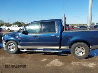 2002 Ford F-150 XLT with VIN 1FTRW07692KC25069, listed as a IAAI auction lot 41387047 with 208,811 mi miles. Bid and sale history available at carsss.com. Image 14.