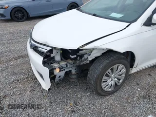 2012 Toyota Camry L z VIN 4T1BF1FK1CU532002, wystawiony jako IAAI lot #42215124 z przebiegiem 209 642 mil mil oraz . Historia ofert i sprzedaży dostępna na DreamBid. Obrazek 6.