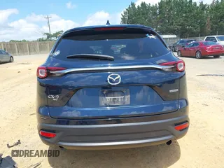 2022 Mazda CX-9 Touring z VIN JM3TCBCY7N0600370, wystawiony jako IAAI lot #42658049 z przebiegiem 113 000 mil mil oraz . Historia ofert i sprzedaży dostępna na DreamBid. Obrazek 17.