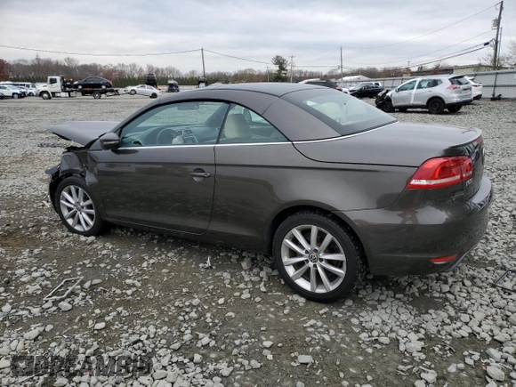 2015 Volkswagen Eos Komfort with VIN WVWBW8AH3FV000399, listed as a Copart auction lot 81398264 with 82,533 mi miles and Salvage Title. Bid and sale history available at DreamBid. Image 2.