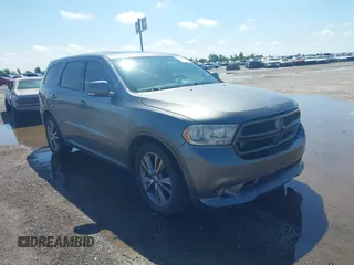 2013 Dodge Durango R/T with VIN 1C4SDHCT7DC564802, listed as a IAAI auction lot 42348957 with 178,354 mi miles and . Bid and sale history available at DreamBid. Image 1.