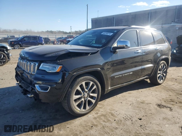 2017 Jeep Grand Cherokee Overland with VIN 1C4RJFCT7HC684746, listed as a Copart auction lot 83259314 with 106,848 mi miles and Salvage Title. Bid and sale history available at carsss.com. Image 1.