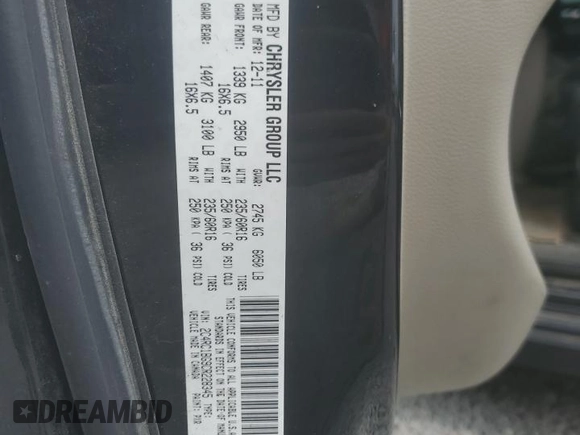 2012 Chrysler Town & Country Touring z VIN 2C4RC1BG9CR228345, wystawiony jako Copart lot #54477725 z przebiegiem 217 041 mil mil oraz Nie do naprawy • Non repairable. Historia ofert i sprzedaży dostępna na DreamBid. Obrazek 13.