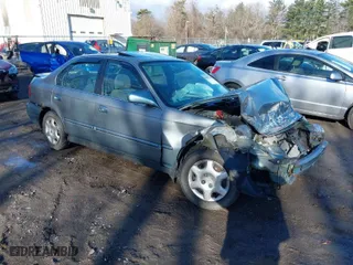 1999 Honda Civic EX with VIN 2HGEJ8643XH511334, listed as a IAAI auction lot 41851364 with 142,632 mi miles. Bid and sale history available at carsss.com. Image 1.