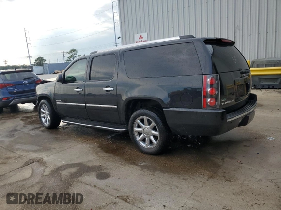 2012 GMC Yukon XL Denali with VIN 1GKS1MEF9CR323090, listed as a Copart auction lot 71675214 with 143,408 mi miles and Salvage Title. Bid and sale history available at carsss.com. Image 2.