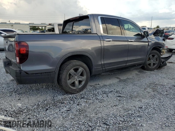 2023 Honda Ridgeline RTL-E with VIN 5FPYK3F79PB010418, listed as a Copart auction lot 62272845 with 39,739 mi miles and Salvage title. Bid and sale history available at DreamBid. Image 3.