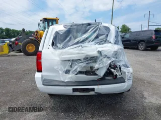 2016 Chevrolet Tahoe Commercial z VIN 1GNSKFEC1GR249946, wystawiony jako IAAI lot #42610587 z przebiegiem Nie podano mil oraz . Historia ofert i sprzedaży dostępna na DreamBid. Obrazek 17.