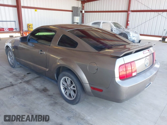 2005 Ford Mustang Deluxe with VIN 1ZVFT80N155128766, listed as a IAAI auction lot 41667434 with 233,175 mi miles. Bid and sale history available at carsss.com. Image 3.