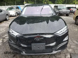 2021 Ford Mustang Mach-E Premium с VIN 3FMTK3RM1MMA04572, выставлен на аукционе Copart как лот 60127765 с пробегом 59 915 миль миль и Списание • Salvage title. История ставок и продаж доступна на DreamBid. Изображение 5.