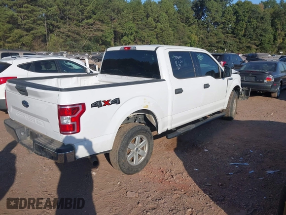 2018 Ford F-150 XL with VIN 1FTEW1E55JKF29898, listed as a IAAI auction lot 40593129 with 158,663 mi miles and . Bid and sale history available at carsss.com. Image 4.