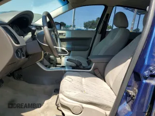 2009 Ford Focus SE with VIN 1FAHP35N09W168306, listed as a Copart auction lot 70276634 with 145,844 mi miles and Salvage Title. Bid and sale history available at carsss.com. Image 7.