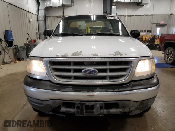 2003 Ford F-150 XL z VIN 2FTRF18W53CA96144, wystawiony jako Copart lot #47589205 z przebiegiem 246 767 mil mil oraz Czysty tytuł • Clean title. Historia ofert i sprzedaży dostępna na DreamBid. Obrazek 5.