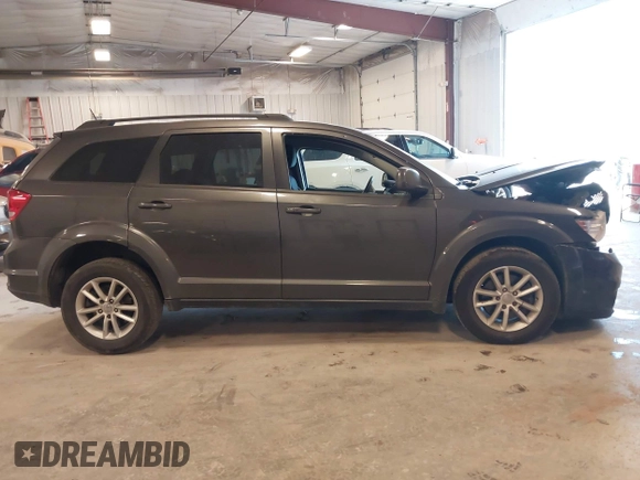 2017 Dodge Journey SXT z VIN 3C4PDCBGXHT534121, wystawiony jako IAAI lot #42145689 z przebiegiem 201 527 mil mil oraz . Historia ofert i sprzedaży dostępna na DreamBid. Obrazek 13.