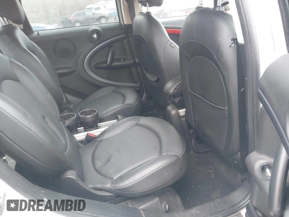 2012 MINI Countryman S with VIN WMWZC5C52CWM12275, listed as a IAAI auction lot 42014546 with 147,494 mi miles and . Bid and sale history available at DreamBid. Image 8.