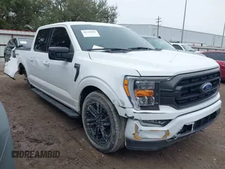2023 Ford F-150 XL with VIN 1FTEW1CP2PKG24142, listed as a IAAI auction lot 41358316 with 11,341 mi miles. Bid and sale history available at carsss.com. Image 1.