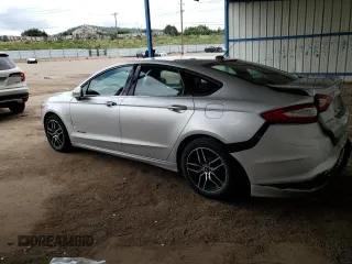 2013 Ford Fusion SE Hybrid z VIN 3FA6P0LU2DR104182, wystawiony jako Copart lot #63107545 z przebiegiem 249 317 mil mil oraz Szkoda całkowita • Salvage title. Historia ofert i sprzedaży dostępna na DreamBid. Obrazek 2.