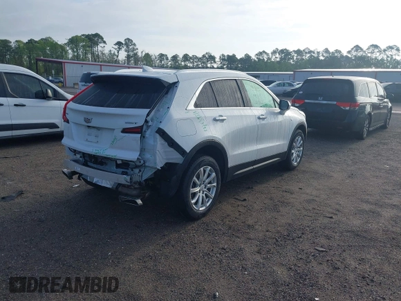 2023 Cadillac XT4 FWD Luxury with VIN 1GYAZAR48PF205055, listed as a IAAI auction lot 41915442 with 42,652 mi miles. Bid and sale history available at carsss.com. Image 4.