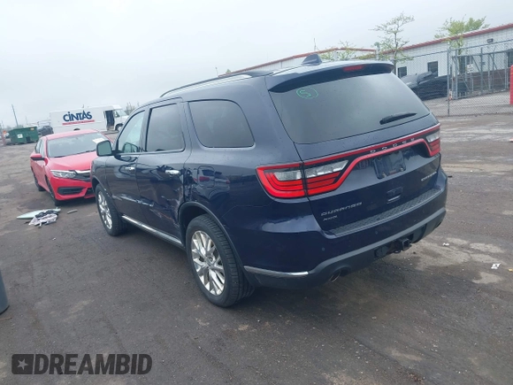 2014 Dodge Durango Citadel with VIN 1C4RDJEG9EC358811, listed as a IAAI auction lot 42176348 with 81,530 mi miles and . Bid and sale history available at DreamBid. Image 3.