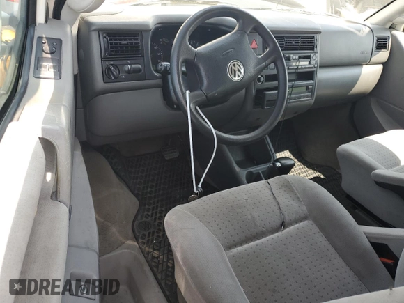 2003 Volkswagen EuroVan MV с VIN WV2MB47033H038192, выставлен на аукционе Copart как лот 67783954 с пробегом 176 595 миль миль и Списание • Salvage title. История ставок и продаж доступна на DreamBid. Изображение 8.