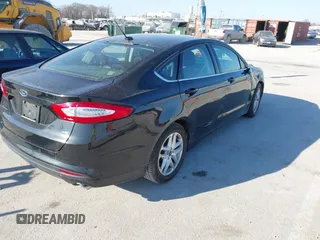 2015 Ford Fusion SE z VIN 3FA6P0H78FR169608, wystawiony jako IAAI lot #41762766 z przebiegiem 146 630 mil mil oraz . Historia ofert i sprzedaży dostępna na DreamBid. Obrazek 4.