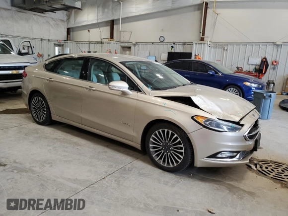 2017 Ford Fusion Hybrid Titanium with VIN 3FA6P0RU3HR360053, listed as a Copart auction lot 63063715 with 127,534 mi miles and Non repairable. Bid and sale history available at DreamBid. Image 4.