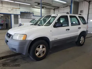 2001 Ford Escape XLS with VIN 1FMYU01181KF33553, listed as a Copart auction lot 52991765 with 214,453 mi miles and Clean Title. Bid and sale history available at carsss.com. Image 1.