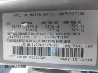 2012 Mazda Mazda3 i Touring with VIN JM1BL1V72C1579695, listed as a IAAI auction lot 41581364 with 126,535 mi miles. Bid and sale history available at carsss.com. Image 9.