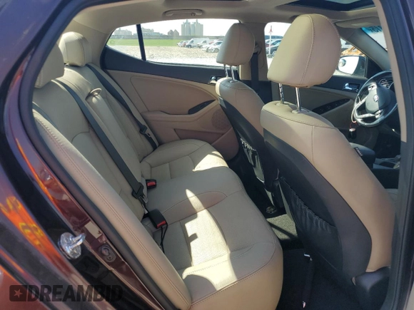 2013 Kia Optima EX z VIN 5XXGN4A70DG186128, wystawiony jako Copart lot #65836315 z przebiegiem 124 488 mil mil oraz Czysty tytuł • Clean title. Historia ofert i sprzedaży dostępna na DreamBid. Obrazek 10.