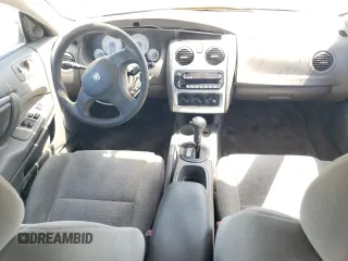 2004 Dodge Stratus SXT z VIN 4B3AG42G64E146011, wystawiony jako Copart lot #70186364 z przebiegiem 184 795 mil mil oraz Szkody całkowita. Historia ofert i sprzedaży dostępna na DreamBid. Obrazek 8.