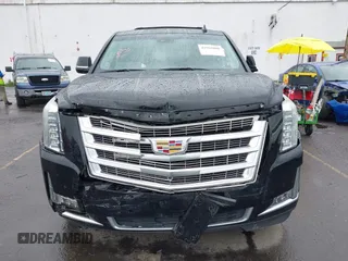 2018 Cadillac Escalade ESV Luxury z VIN 1GYS4HKJ2JR179215, wystawiony jako IAAI lot #41969880 z przebiegiem 45 262 mil mil oraz . Historia ofert i sprzedaży dostępna na DreamBid. Obrazek 12.