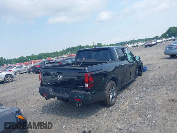 2023 Honda Ridgeline RTL-E with VIN 5FPYK3F71PB022739, listed as a IAAI auction lot 42447428 with 19,702 mi miles and . Bid and sale history available at DreamBid. Image 16.