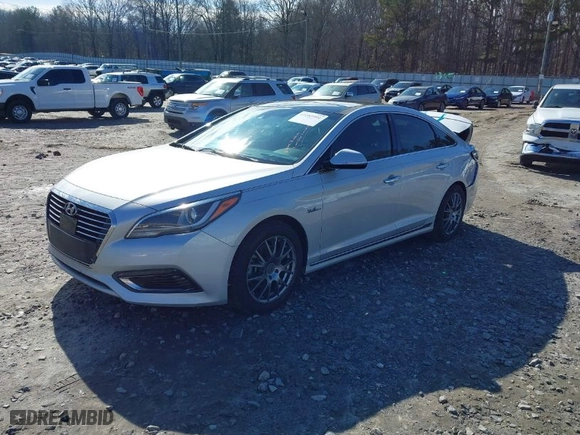 2016 Hyundai Sonata Hybrid Limited with VIN KMHE34L10GA018216, listed as a IAAI auction lot 41281991 with 129,429 mi miles. Bid and sale history available at carsss.com. Image 2.
