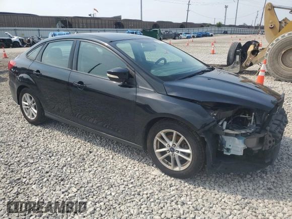 2016 Ford Focus SE with VIN 1FADP3F22GL233402, listed as a Copart auction lot 60854175 with 77,002 mi miles and Salvage title. Bid and sale history available at DreamBid. Image 4.