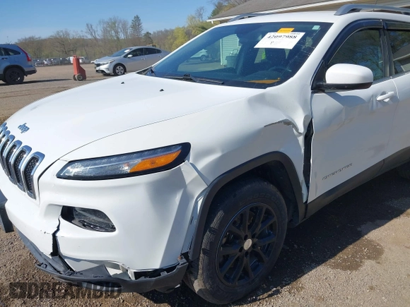 2015 Jeep Cherokee Latitude with VIN 1C4PJMCS0FW790017, listed as a IAAI auction lot 42097988 with 105,990 mi miles and . Bid and sale history available at DreamBid. Image 6.
