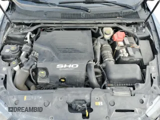 2015 Ford Taurus SHO z VIN 1FAHP2KTXFG121786, wystawiony jako Copart lot #49718275 z przebiegiem 114 946 mil mil oraz Szkoda całkowita • Salvage title. Historia ofert i sprzedaży dostępna na DreamBid. Obrazek 12.