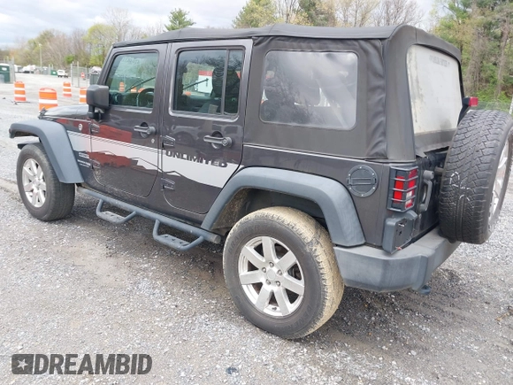 2018 Jeep Wrangler JK Unlimited Sport S with VIN 1C4BJWDG8JL895981, listed as a IAAI auction lot 42048316 with 95,457 mi miles. Bid and sale history available at carsss.com. Image 3.